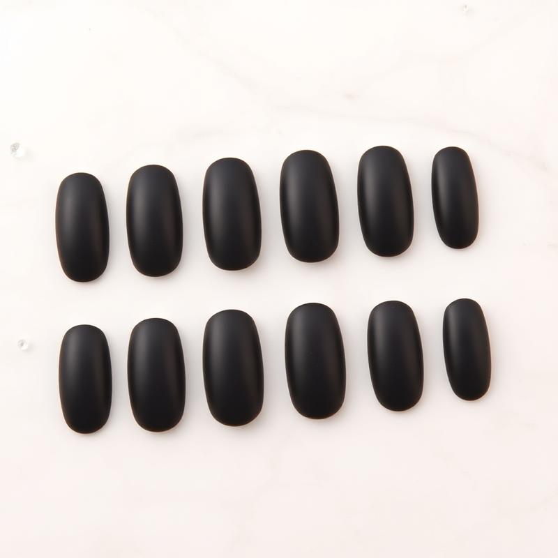 Onyx Satin — Almond Black press-on nails